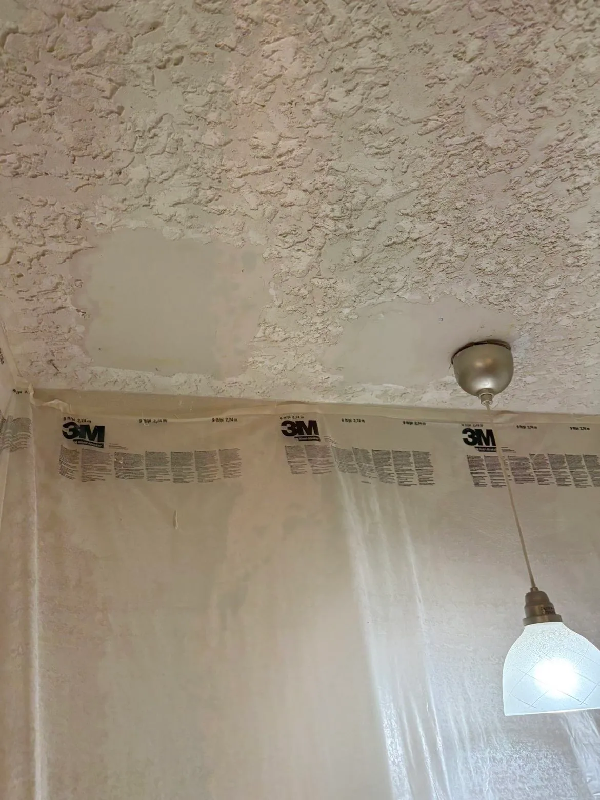 Kitchen ceiling patches sanded smooth and ready for texture application