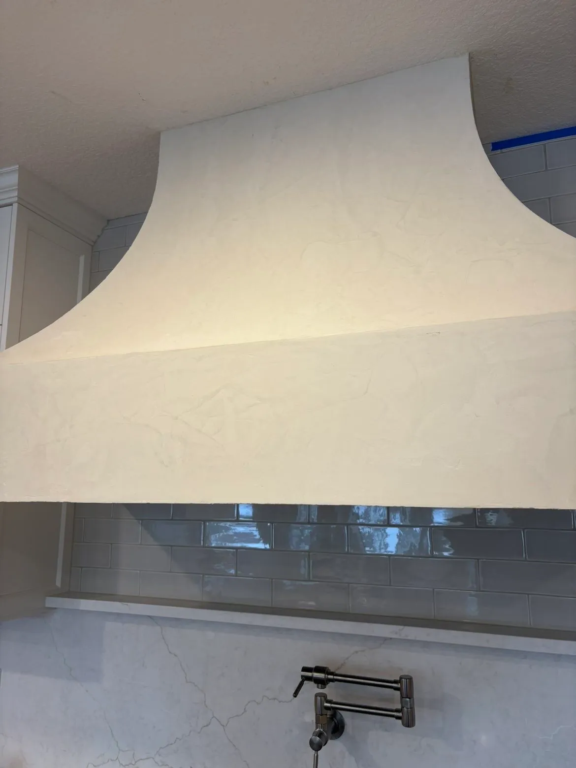 Custom kitchen hood with Fresco Harmony hand-applied finish in progress