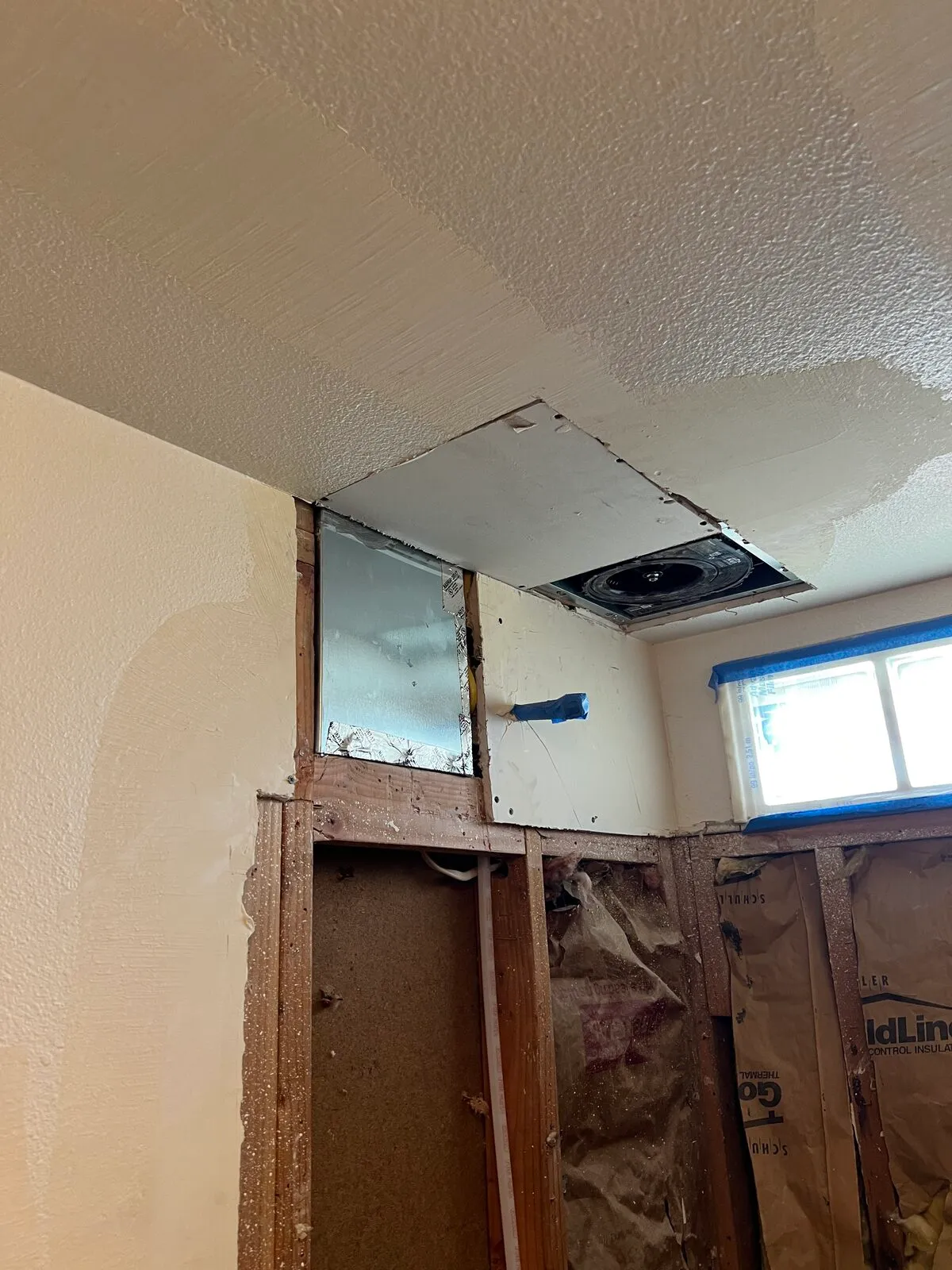 Bathroom drywall patch around plumbing rough-in