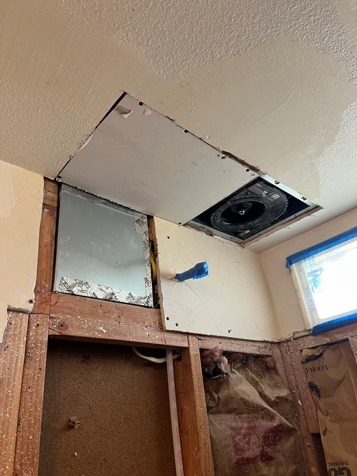 Bathroom wall repair work surrounding the shower area