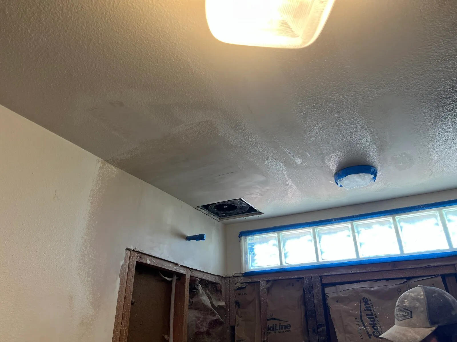 Bathroom drywall patch work around shower wall