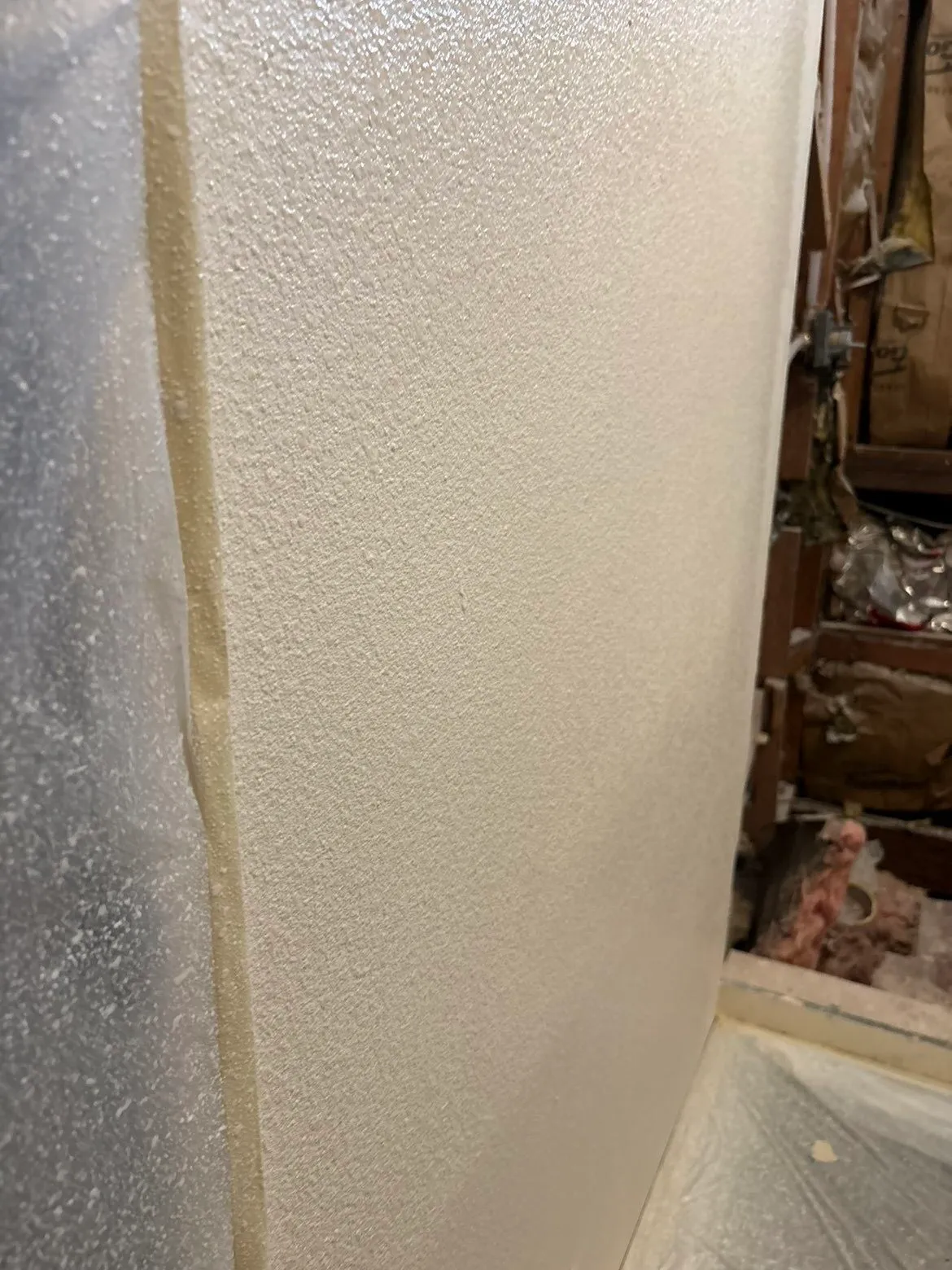 Finished bathroom wall with texture matched and ready for paint