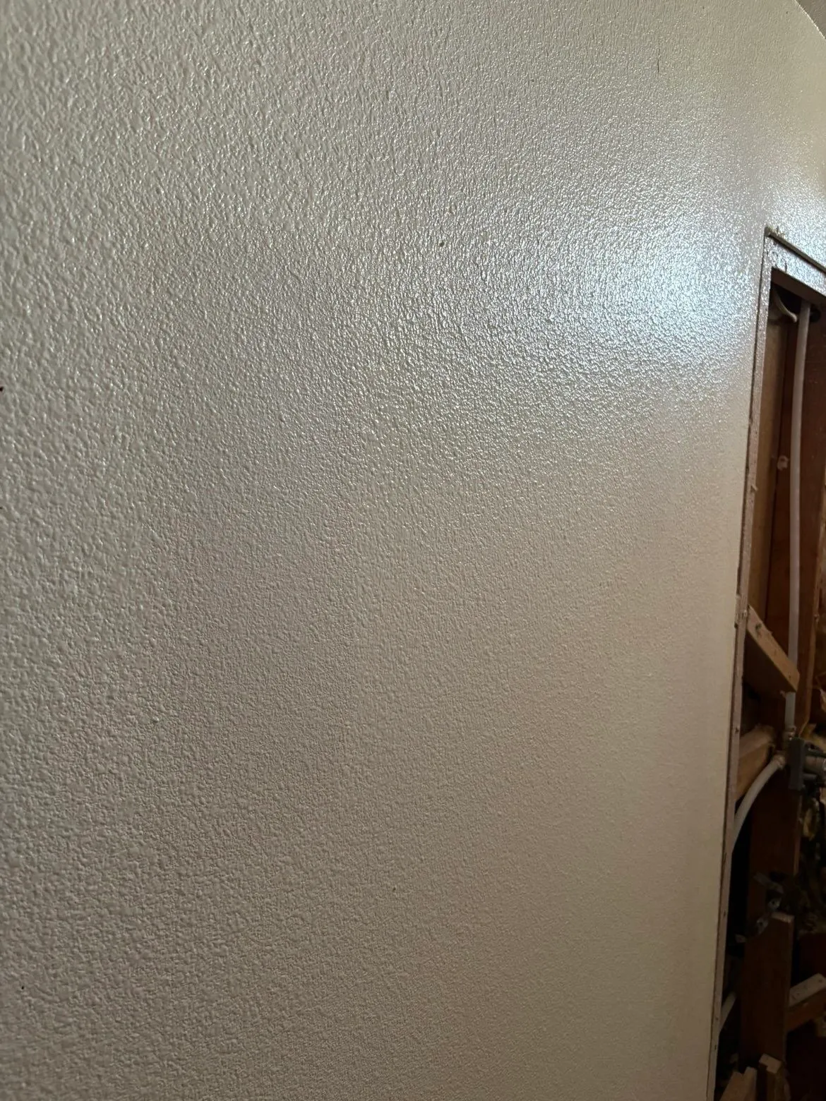 Bathroom wall texture matched to existing surface, blended seamlessly