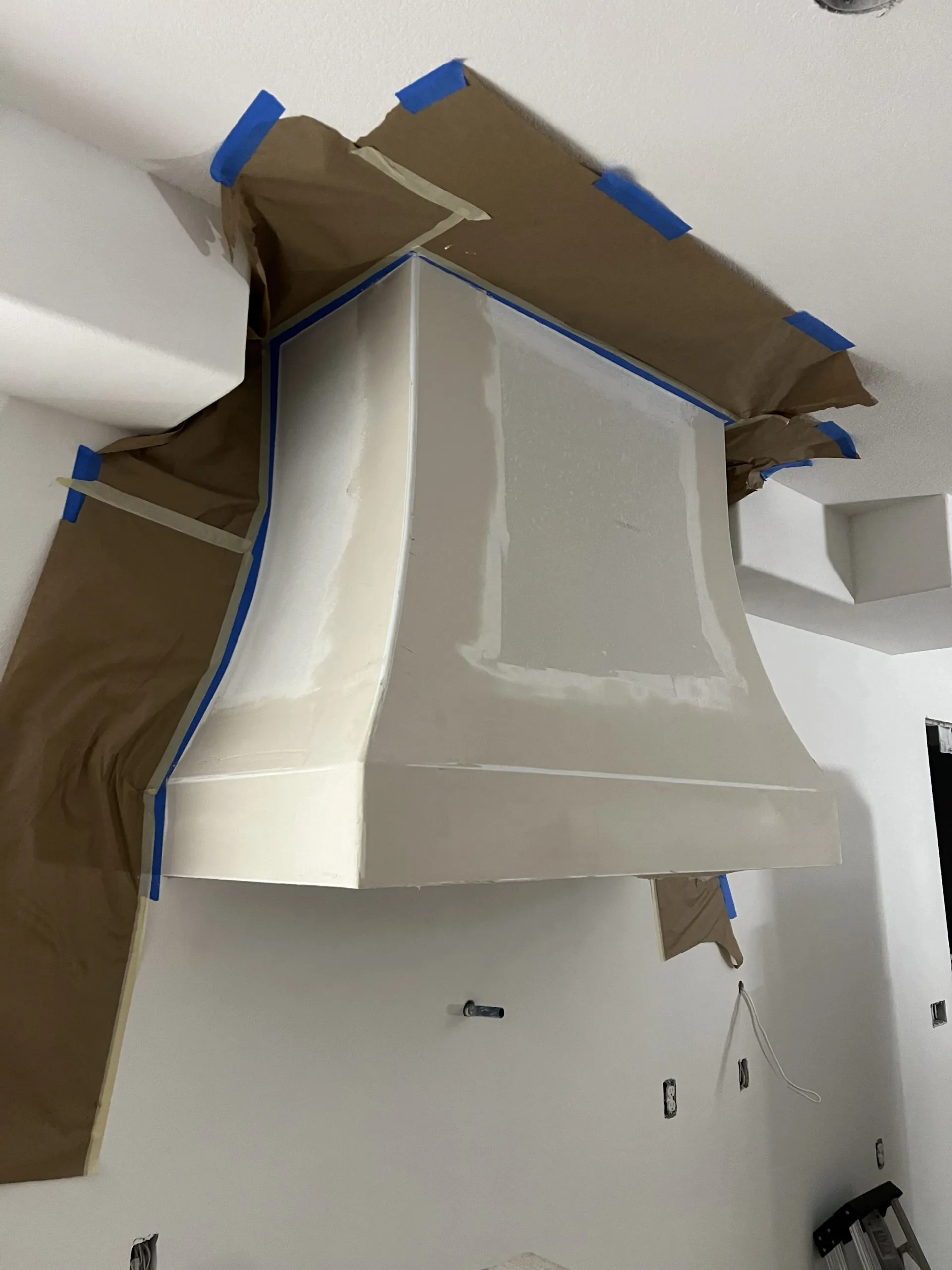 Residential drywall installation with window framing detail