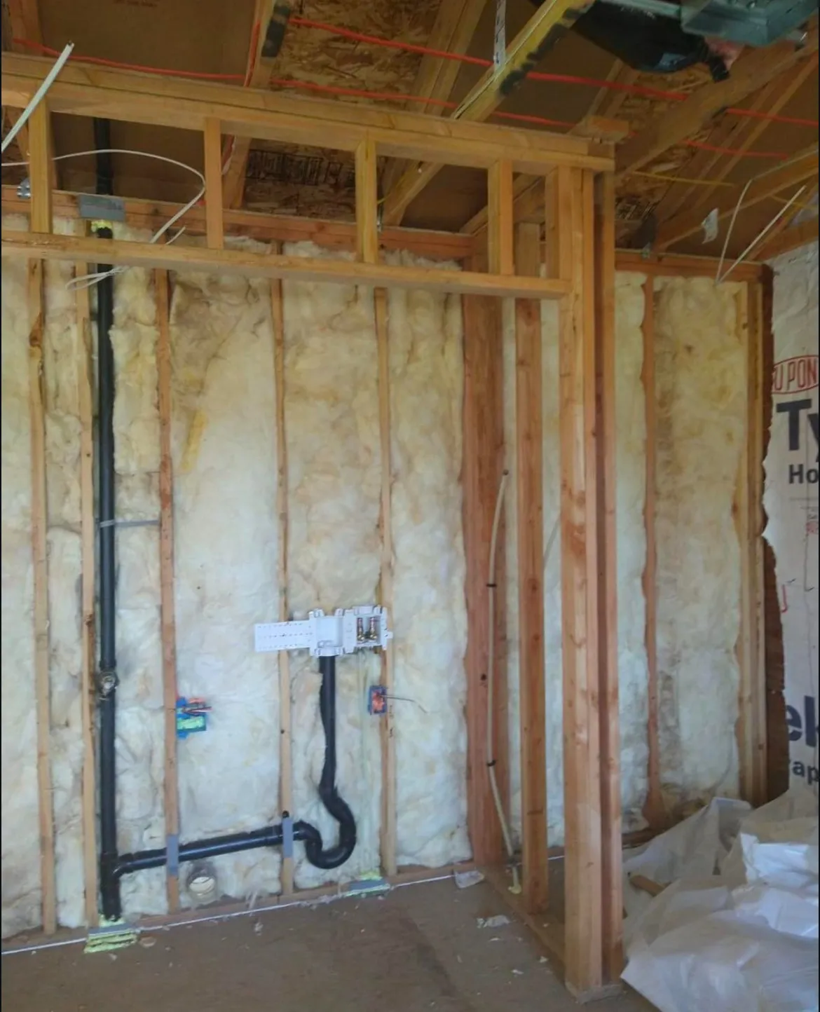 Kitchen drywall finishing with cabinet masking