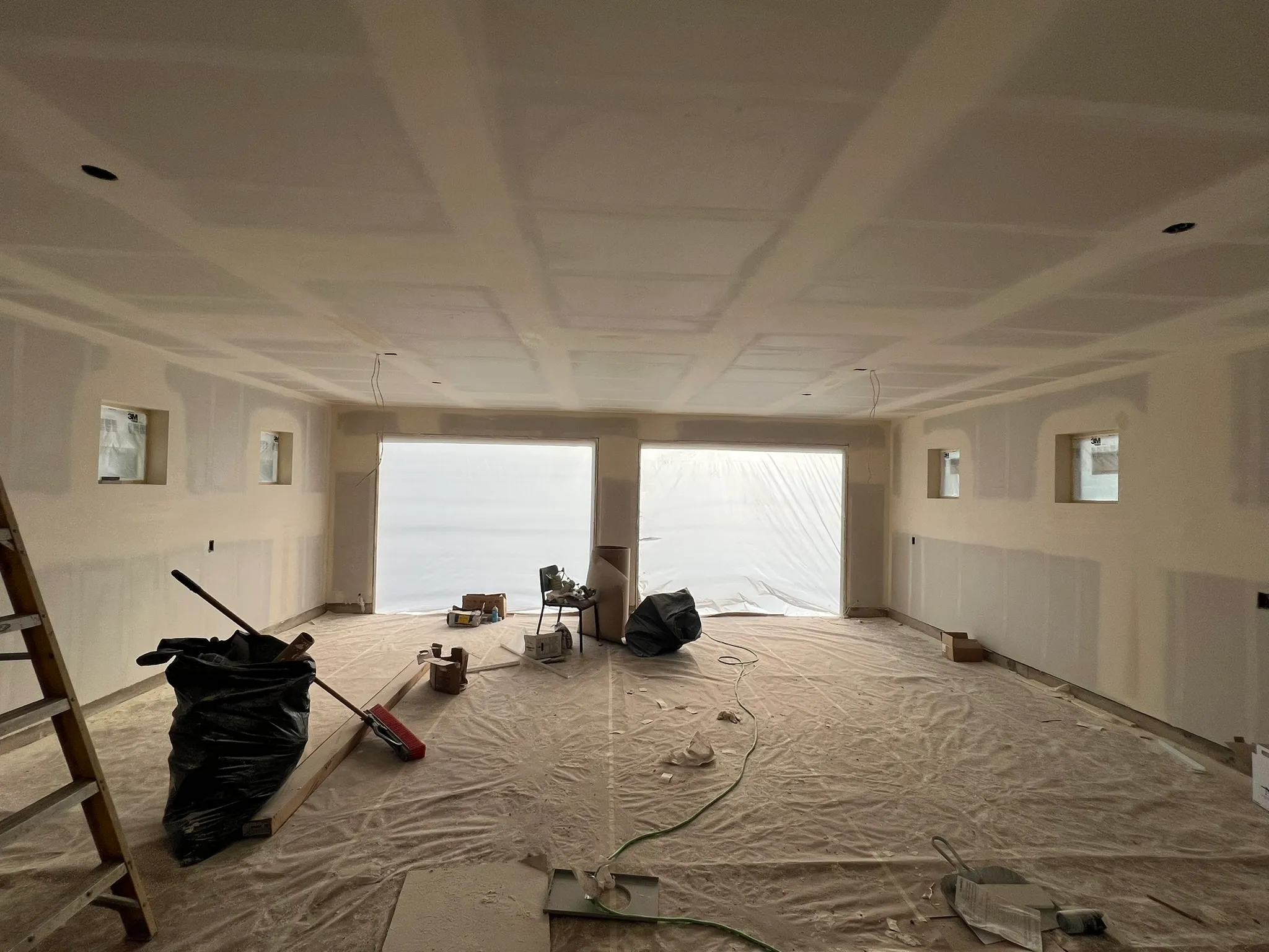 Taping and mudding drywall joints in new construction home in Battle Ground WA