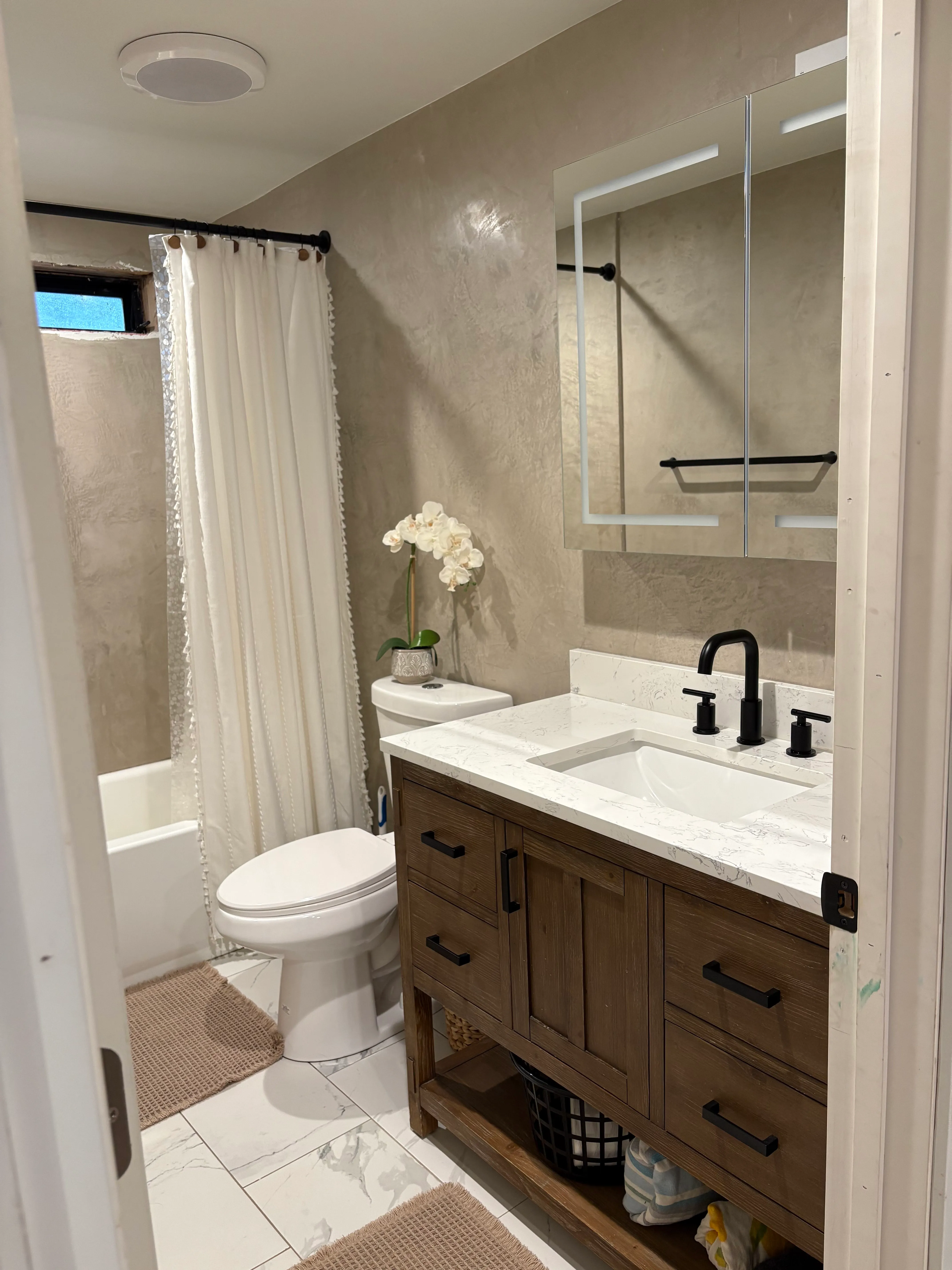 Decorative plaster applied over existing surfaces by AvilaCo Drywall