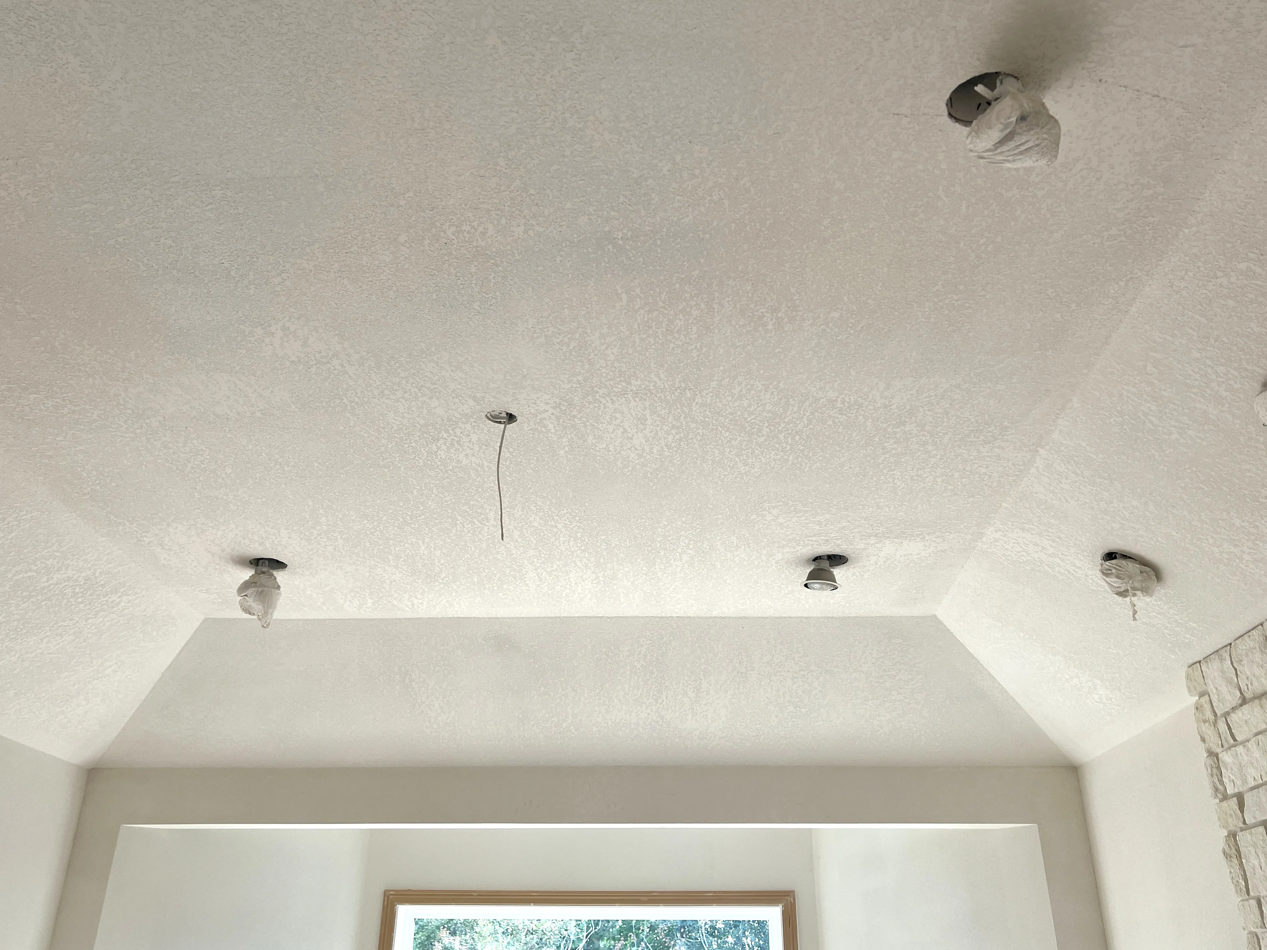 Smooth ceiling finish after popcorn removal by AvilaCo Drywall